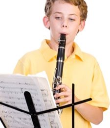 a boy playing his flute
